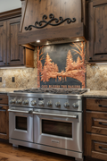 Large 72 inch woodland deer copper backsplash panel in black and copper finish installed in rustic luxury cabin kitchen